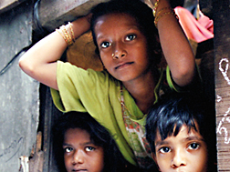 Children looking out window - cropped